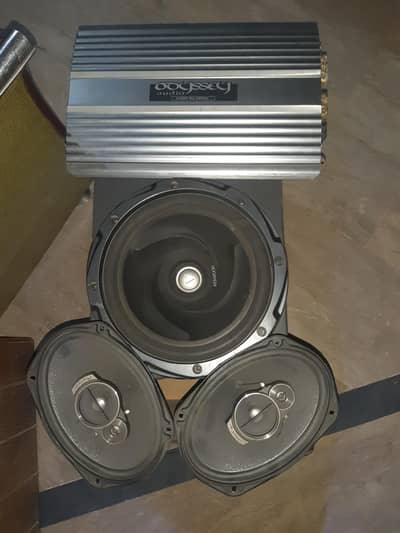 Complete sound system along with woofer , amplifier and speakers