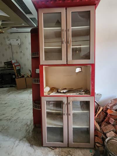 crockery showcase with sets of cabinets