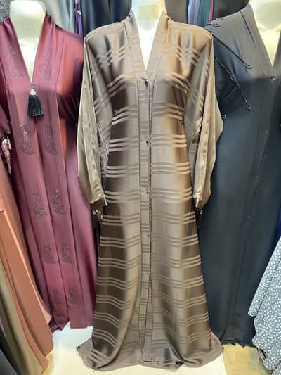 TikTok self gawn abaya