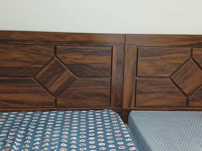 two single beds with durafoam mattress