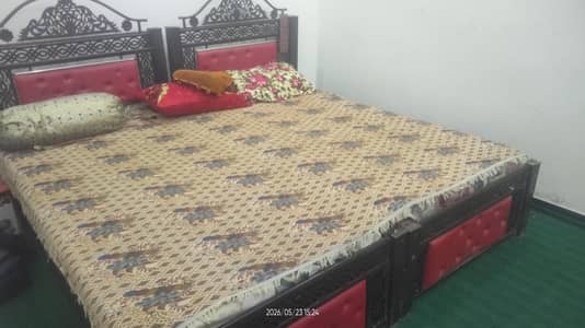 I am selling my double iron bed in good condition . urgent sale