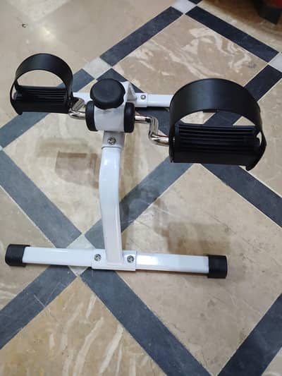 Portable Mini Cycle Pedal Exerciser with Adjustable Resistance.