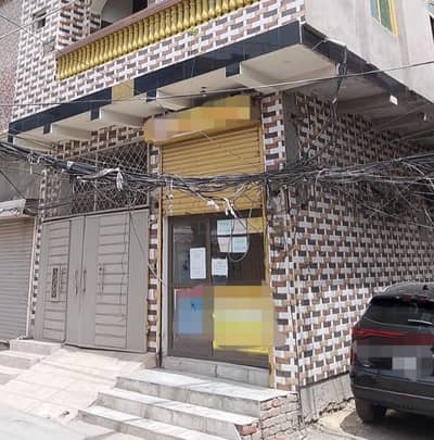 Looking For A Corner Building In Awan Town