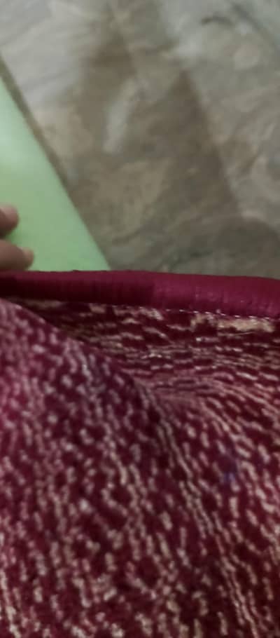 Maroon colour carpet