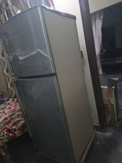dawalance ka jumbo size Fridge Hy kohi repair ni howa original halat m