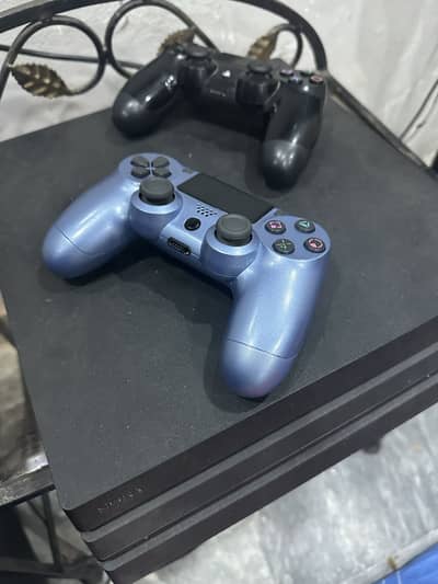 Ps 4 pro 1 tb with box 10/10 condition with 2 controllers