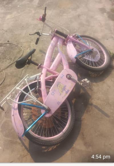 Little girls pink doll bicycle, few days used, for sale