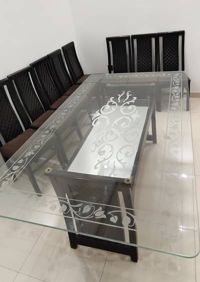 8 seater Dinning table with wooden chairs and 12mm glass top