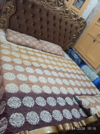 bed and dressing table with site tables