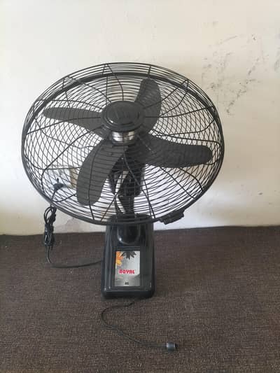 Royal company bracket fan for sale.