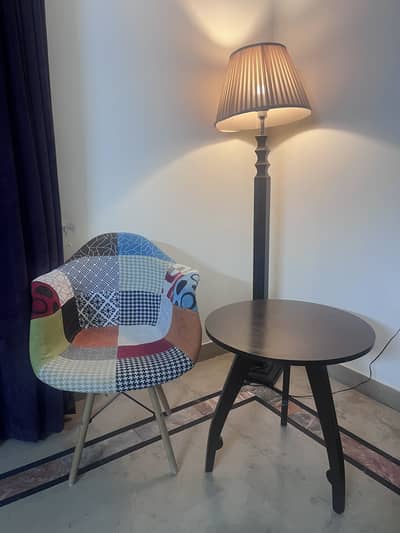 Coffee table with chair and lamp