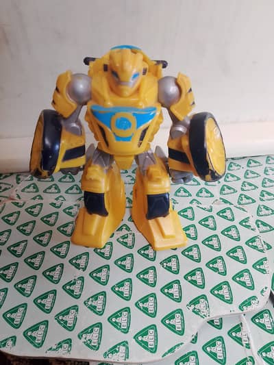 Yellow Transforming Robot Toy – Action Figure with Wheels