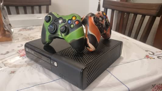 XBOX 360 E SLIM 2014 (with games + console price 41k)