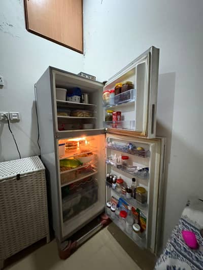Haier Red glass jambo size fridge for sale good condition. 03218858799