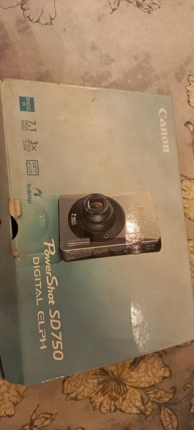 Slightly Used Canon Camera in a very good condition. .