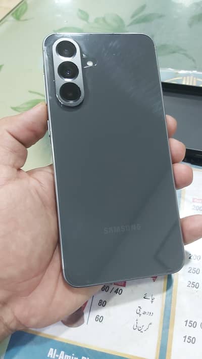 Samsung A56 5g 8/256 6month used with box