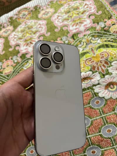 iPhone 15 pro natural titanium 128 J. V/Non-Pta