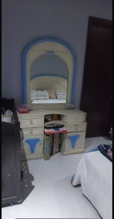Bed and dressing table