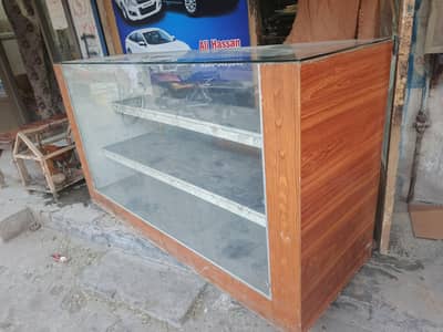 6 feet wt 2 feet deep hight 40 inch 8 mm glass front 5mm and two shelf