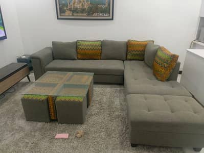 L-Shape sofa 7 seater with table and it's 4 mini chairs