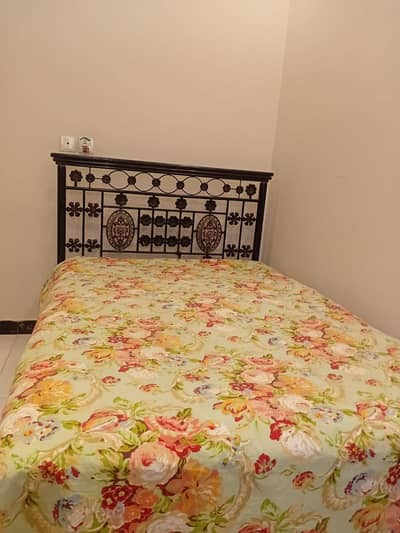 rod iron single bed