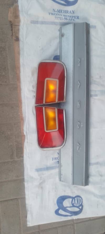 Mazda 1300 back lights and garnish