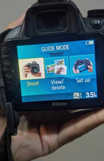 nikon d3100 dslr with 200mm lens