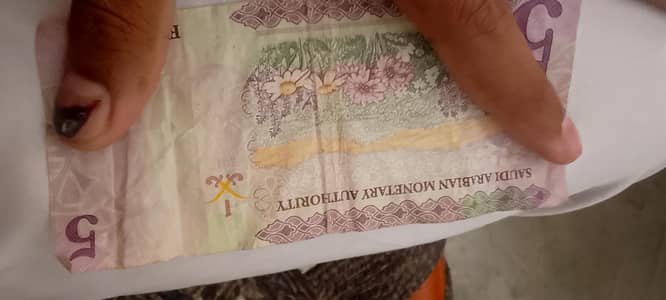 Coin and note of different countrys
