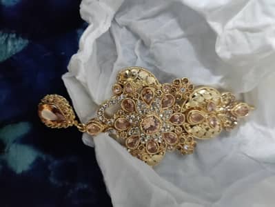 Golden in colour necklace ND earring