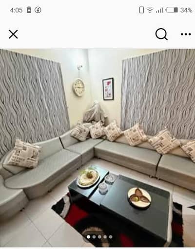 8 siter L shaped sofa and table good candtion