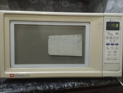 Dawlence microwave. 55 ltr. good condition. white colour.