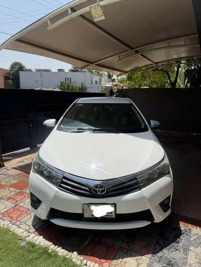 Toyota Corolla Altis 1.6 model 2015 register Islamabad