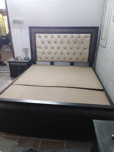 double bed with side tables and dressing