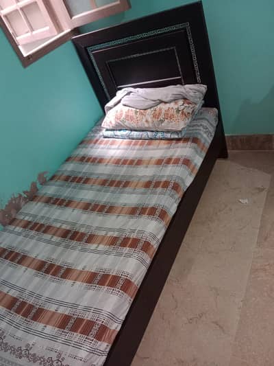 single bad with mattress and dressing table