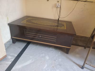 fascinating table with beautiful brown colour and with a drawer