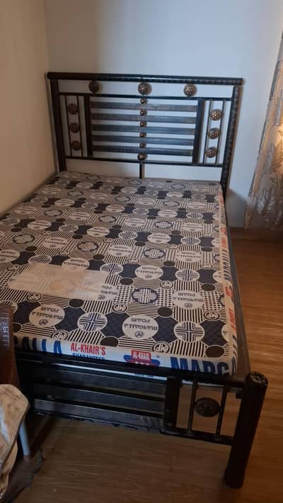 best condition- 6*4 iron bed with mattress