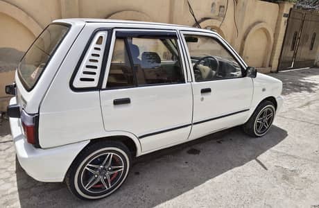 Mehran 2018 white Colour Alloy rim Installed