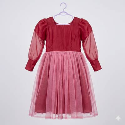 pink Barbie frock with bow belt and puff sleeves.