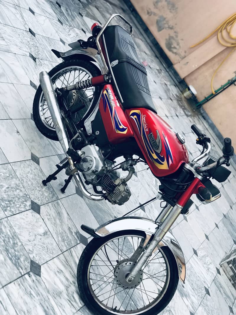 United 70cc 6