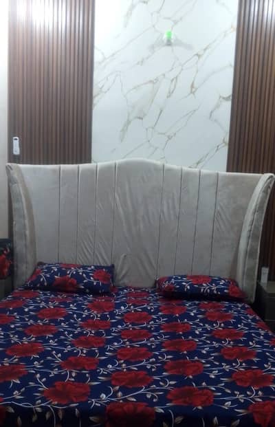 Bed With Puffy and Side Tables