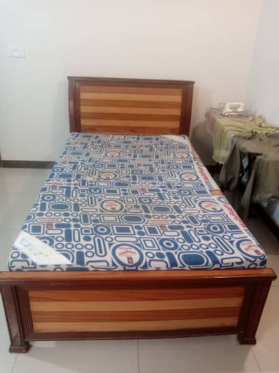 Queen sized bed with mattress