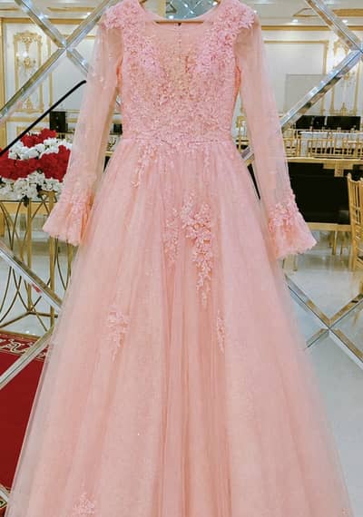 A pink long frock with tail