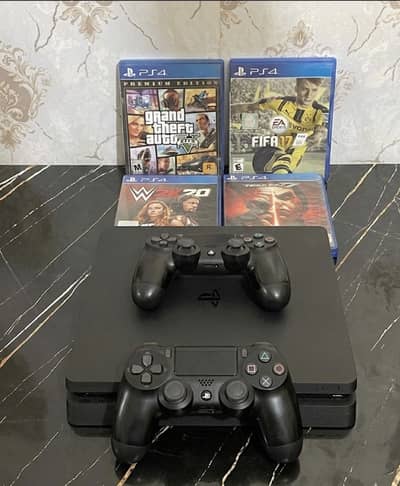 PS4 Slim 1TB – Excellent Condition with 2 Controllers & Games!
