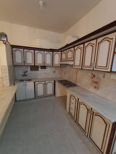 Gulshan Iqbal block 13D1 240 square yards  West open ground Floor portion For Rent 3 Bed DD American kitchen car Parking demand 1 Lac 15000 *Code(16482)*
