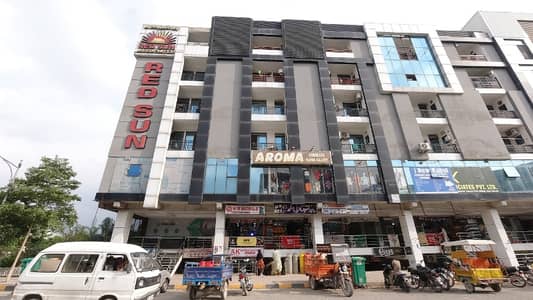 DIRECT OWNER 2 Bed Corner Apartment on 4rth Floor Available For Sale In Red Sun CBC Plaza Faisal Town F-18 Block A Islamabad.
