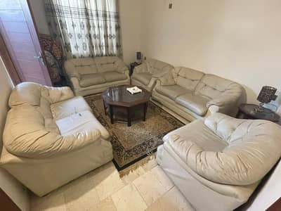 7 seater sofa set on sell with curtain.