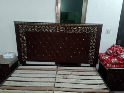 bed with  two side table and  dressing table