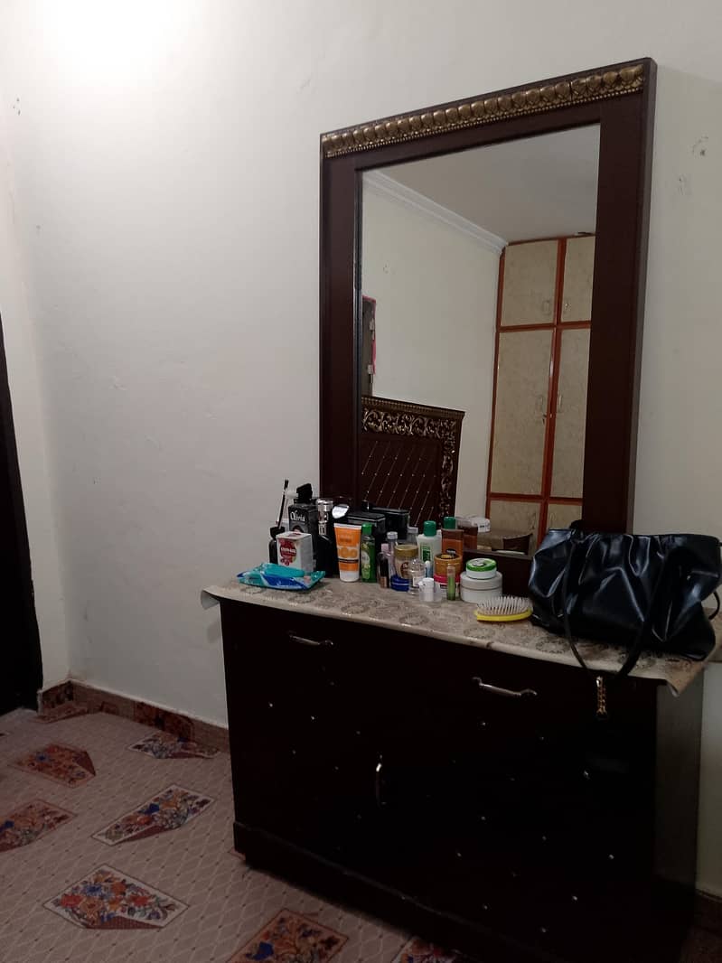 bed with  two side table and  dressing table 6