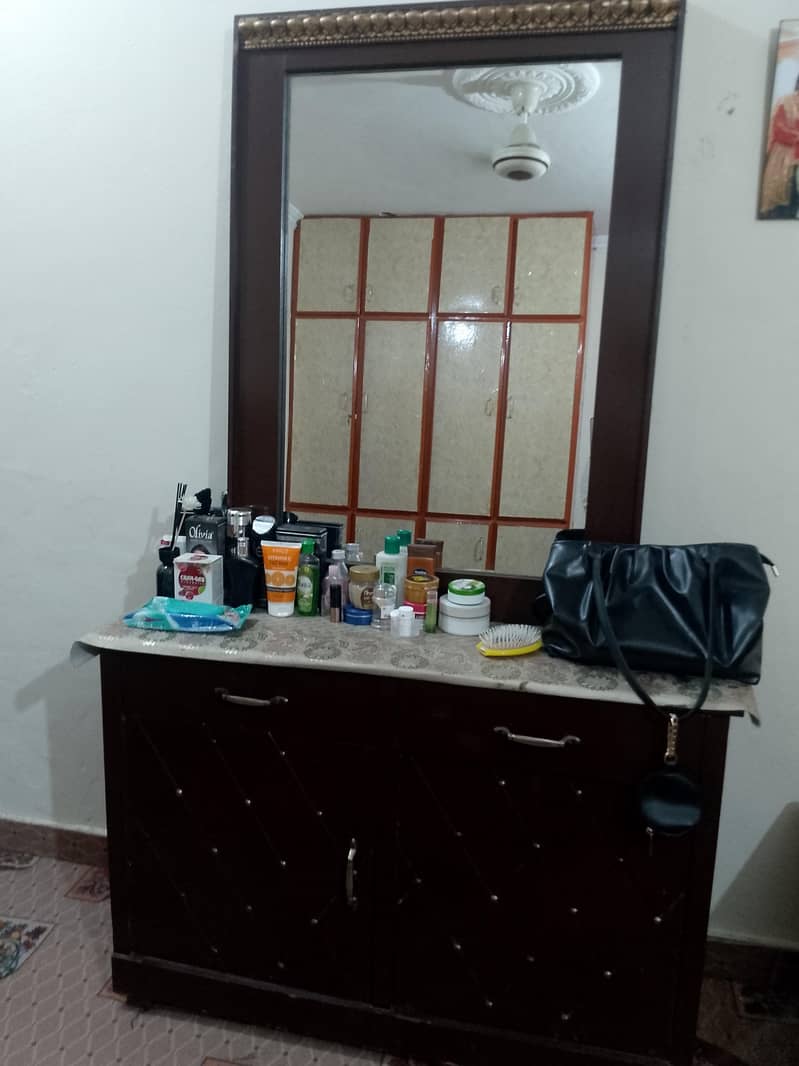 bed with  two side table and  dressing table 7