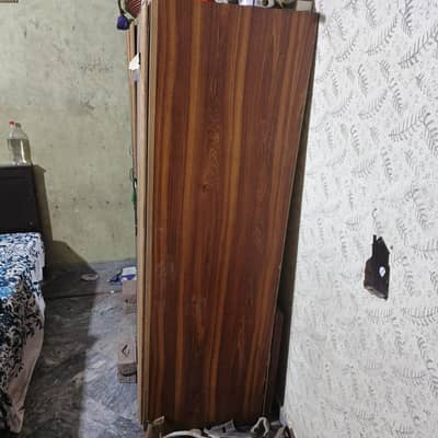big three door wooden wardrobe
